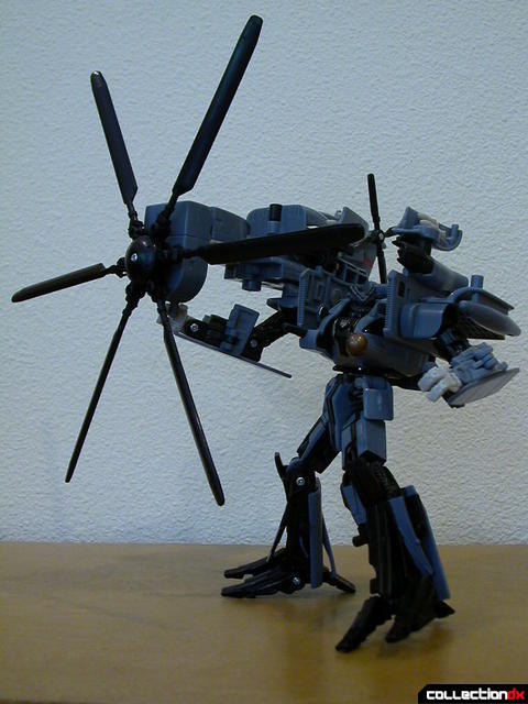 Decepticon Blackout- robot mode (posed with rotor weapon)