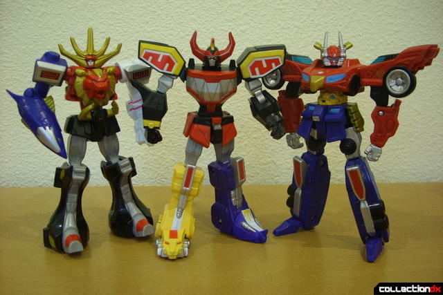 Retrofire Wild Force (L), Mighty Morphin' (C), and High Octane (R) Megazords posed