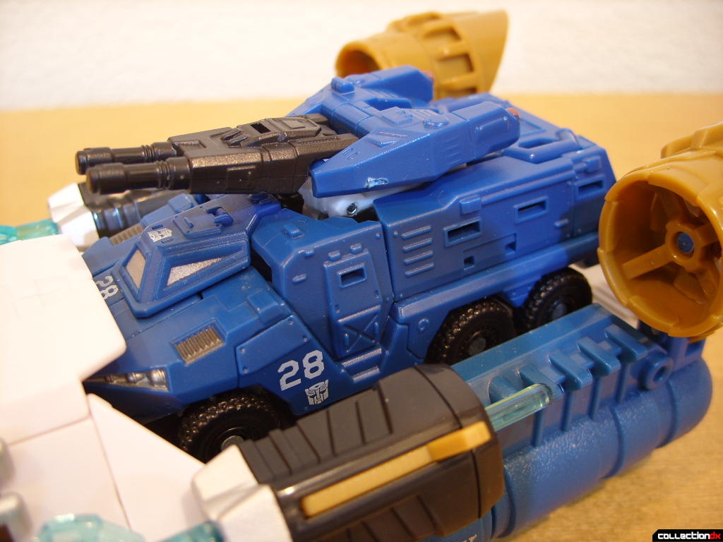 Voyager-class Autobot Sea Spray- vehicle mode (ramp, holding Scout-class Autobot Breacher)